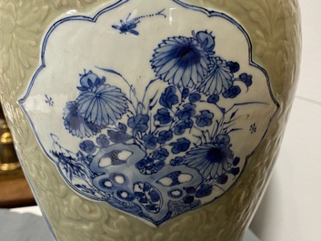 A Chinese blue and white on carved celadon-glazed ground vase, Kangxi
